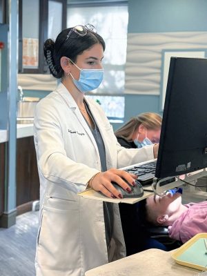 Dr. Bouaziz Reviewing Records